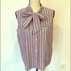 Fabulous Love Moschino sleeveless snap shirt.